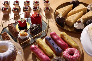 Buffet menu. Delicious desserts on table, closeup