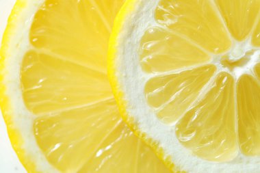 Arka plan olarak taze limon parçaları, makro görünüm