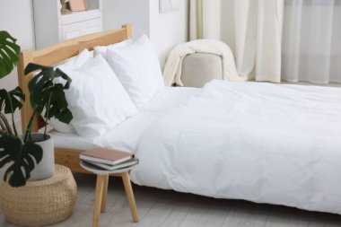 Beautiful room with comfortable bed. Interior design