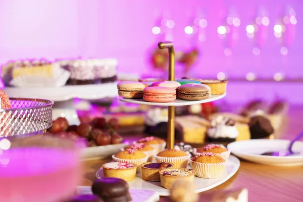 Buffet menu. Different delicious desserts on table, selective focus