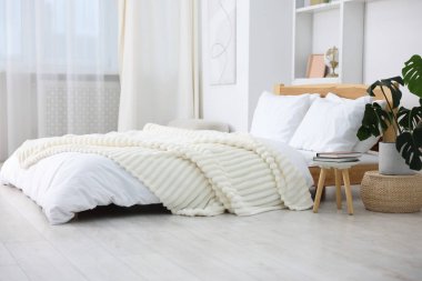 Beautiful room with comfortable bed. Interior design