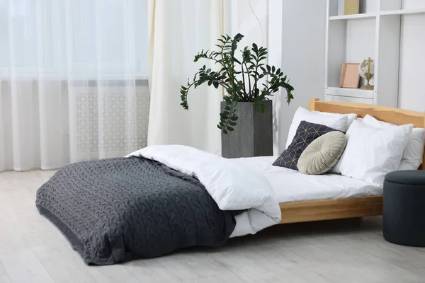 Beautiful room with comfortable bed. Interior design