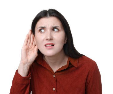 Beyaz arka planda el ele hareketler gösteren bir kadın.