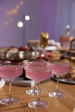 Buffet menu. Delicious desserts and drinks on table, selective focus