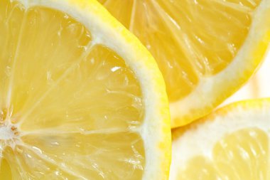 Arka plan olarak taze limon parçaları, makro görünüm