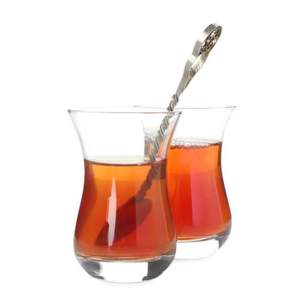 Traditional Turkish tea in glass cups isolated on white