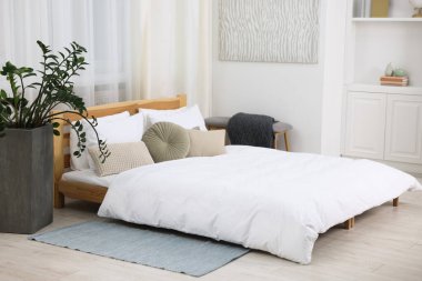 Beautiful room with comfortable bed. Interior design