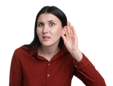 Beyaz arka planda el ele hareketler gösteren bir kadın.