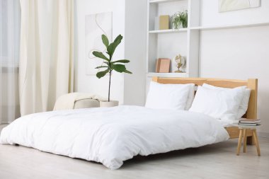 Beautiful room with comfortable bed. Interior design