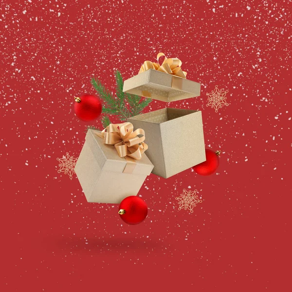 Noel ya da yeni yıl kutlaması. Hediye kutuları ve şenlikli dekorlar koyu kırmızı arka planda havada uçuşuyor.