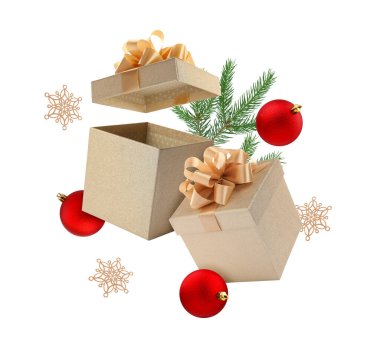 Noel ya da yeni yıl kutlaması. Hediye kutuları ve şenlikli dekorlar beyaz arka planda havada uçuşuyor.