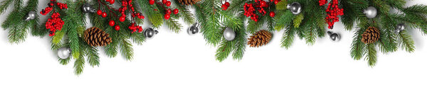Christmas balls and fir tree branches on white background. Banner design