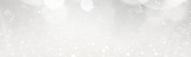 Noel arkaplanı beyaz parıltılı ve ışık saçan. Pankart tasarımı
