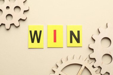 Kelime oyunu kazan ve bej arka planda vites değiştir, düz yat