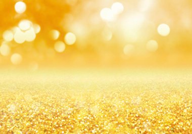 Altın parıltılar ve ışık saçan Noel arkaplanı