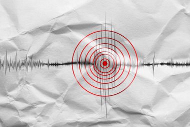 Deprem, sismogramda kırmızı dairelerle işaretlenmiş. Sismometrenin grafiği