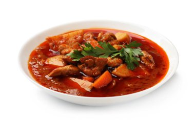 Lezzetli pişirilmiş güveç ve beyaz sebzeler.