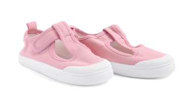 Bir çift şık çocuk ayakkabısı beyaza izole edilmiş.