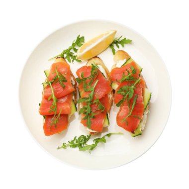 Somon, krem peynirli, salatalıklı, roka ve limonlu leziz bruschetta.