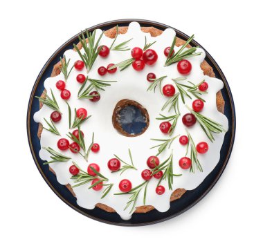 Kremalı, yaban mersinli ve biberiyeli leziz bir Noel pastası.