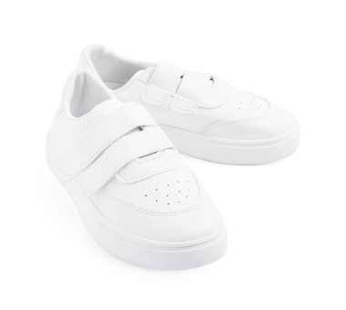 Bir çift şık çocuğun spor ayakkabısı beyaza izole edilmiş.