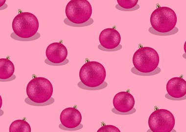 Pembe arka planda Noel topları. Şenlik tekrarlayan şablon