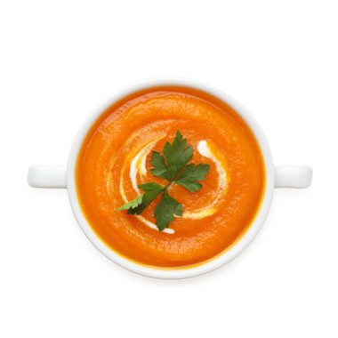 Maydanozlu balkabağı kremalı çorba, izole edilmiş beyaz, üst manzara.