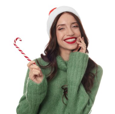 Beyaz arka planda Noel Baba ve şeker kamışı olan güzel bir kadın. Noel sezonu