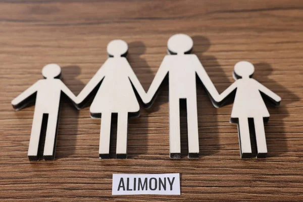 Sözcükler, nafaka ve aile figürleri ile birlikte kağıt kağıt tablo, üst görünüm