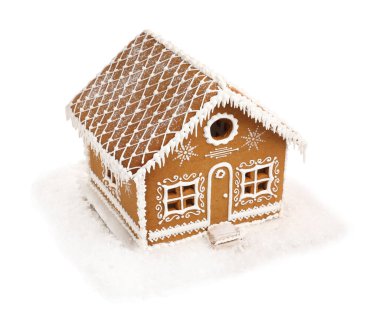 Beyaz üzerine izole edilmiş güzel zencefilli kurabiye evi. Noel hediyesi