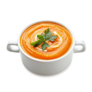 Lezzetli balkabağı kremalı çorba, maydanozlu ve yalıtılmış beyaz.