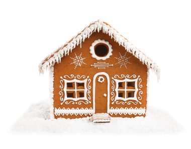 Beyaz üzerine izole edilmiş güzel zencefilli kurabiye evi. Noel hediyesi