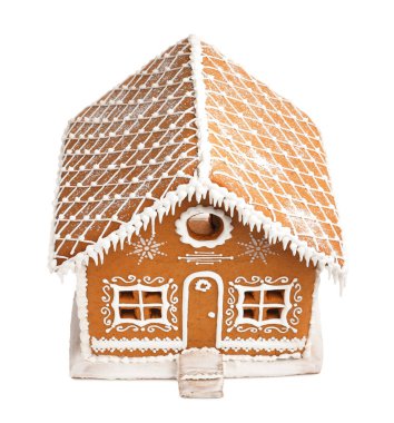 Beyaz üzerine izole edilmiş güzel zencefilli kurabiye evi. Noel hediyesi