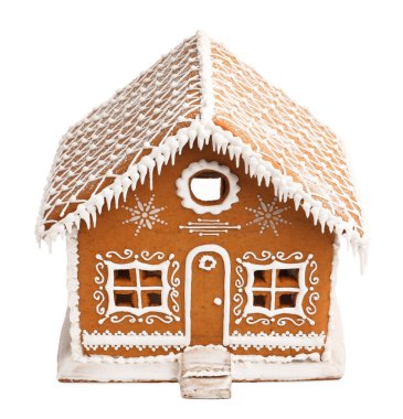 Beyaz üzerine izole edilmiş güzel zencefilli kurabiye evi. Noel hediyesi