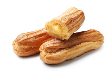 Kremalı, beyaz üzerine izole edilmiş nefis ekler.