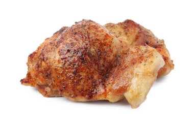 Tasty roasted chicken thighs isolated on white