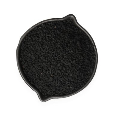 Kasedeki siyah kimyon tohumları beyaza izole edilmiş.