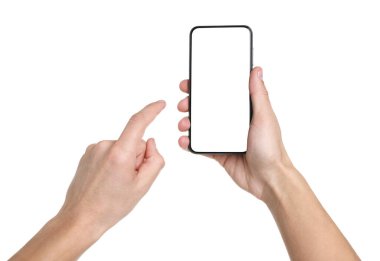 Man holding smartphone with blank screen on white background, closeup. Mockup for design