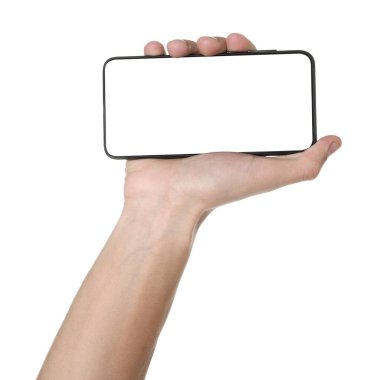 Man holding smartphone with blank screen on white background, closeup. Mockup for design