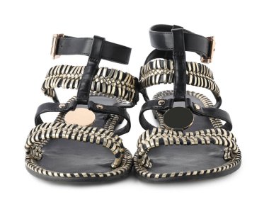 Beyaza izole edilmiş şık gladyatör ayakkabıları.