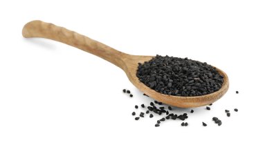 Beyaz kaşıkta siyah kimyon tohumları.