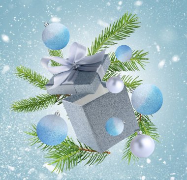 Hediye kutusu, şenlikli süsler ve pastel mavi arka planda havada uçuşan kar. Mutlu Noeller ve Mutlu Noeller kartı
