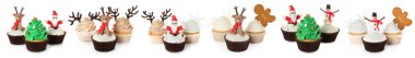 Christmas cupcakes isolated on white, set. Festively decorated dessert