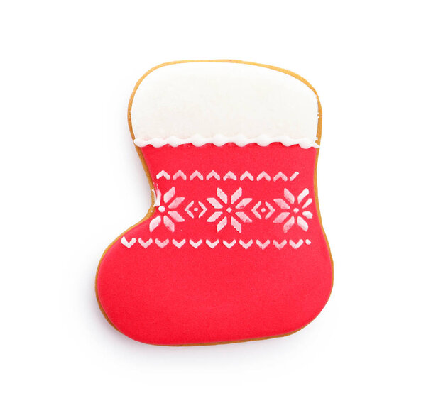 Gingerbread cookie in shape of stocking isolated on white, top view. Christmas treat