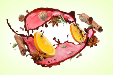 Açık yeşil arka planda şarap, baharat ve portakal dilimleri.