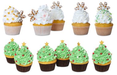 Christmas cupcakes isolated on white, set. Festively decorated dessert