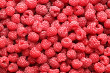 Arka plan olarak taze ahududu, üst manzara