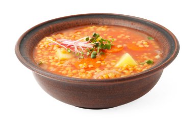 Beyaz tenceredeki lezzetli mercimek çorbası.