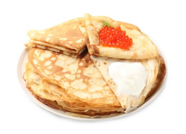 Kırmızı havyarlı lezzetli krepler ve beyaz üzerine ekşi krema.