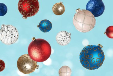 Noel topları açık mavi arka planda bokeh ışıklarıyla düşüyor. Şenlikli süsler